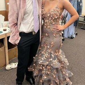 dress worn once. has not been fitted or sewn in. willing to accept lower prices